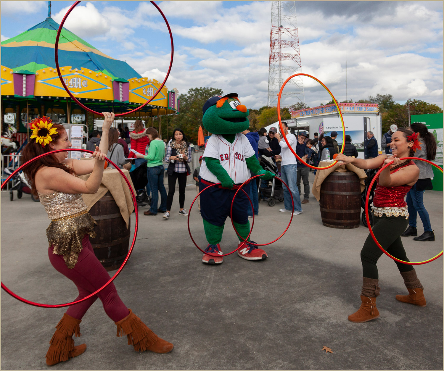 Community event at the Pattern District in Newton Upper Falls, MA, featuring live performers, families, and outdoor entertainment.